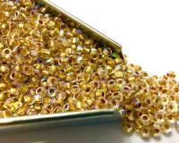 11/0 Charlotte Cut Beads: Patina Dull Gold Lined Aurore Boreale