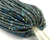 Charlotte Cut Seed Beads 11/0, Patina Matt Black Diamond Aurore Boreale