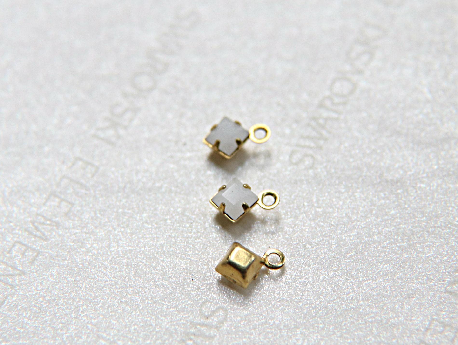 Swarovski 4mm fancy stone square setting drop one loop White Alabaster (281) 6/12/36/144/720 Pieces jewelry supplies in Brass/Vintage Black