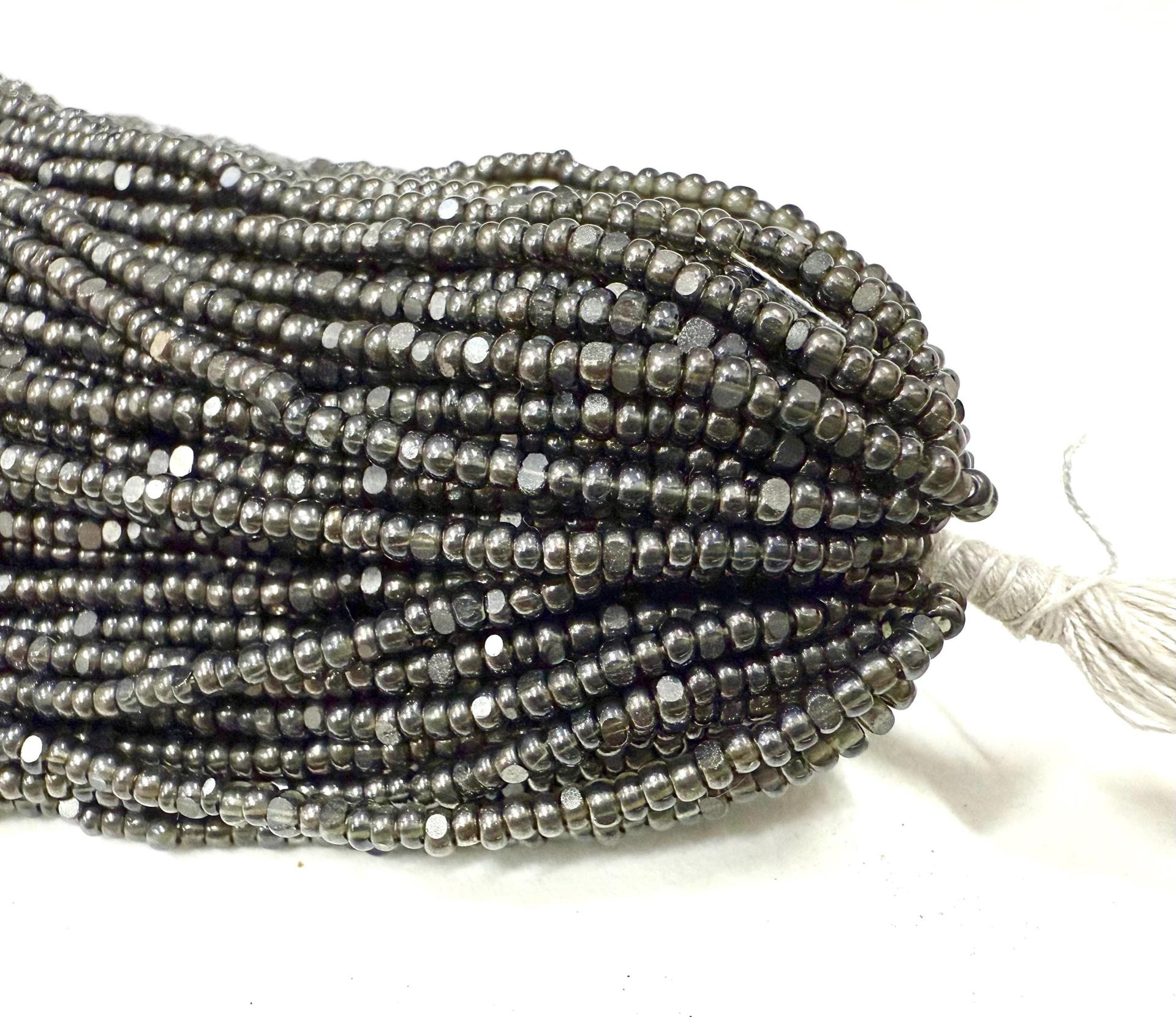 Ionized Transparent Black Diamond Charlotte Cut Seed Beads, 11/0 Hanks