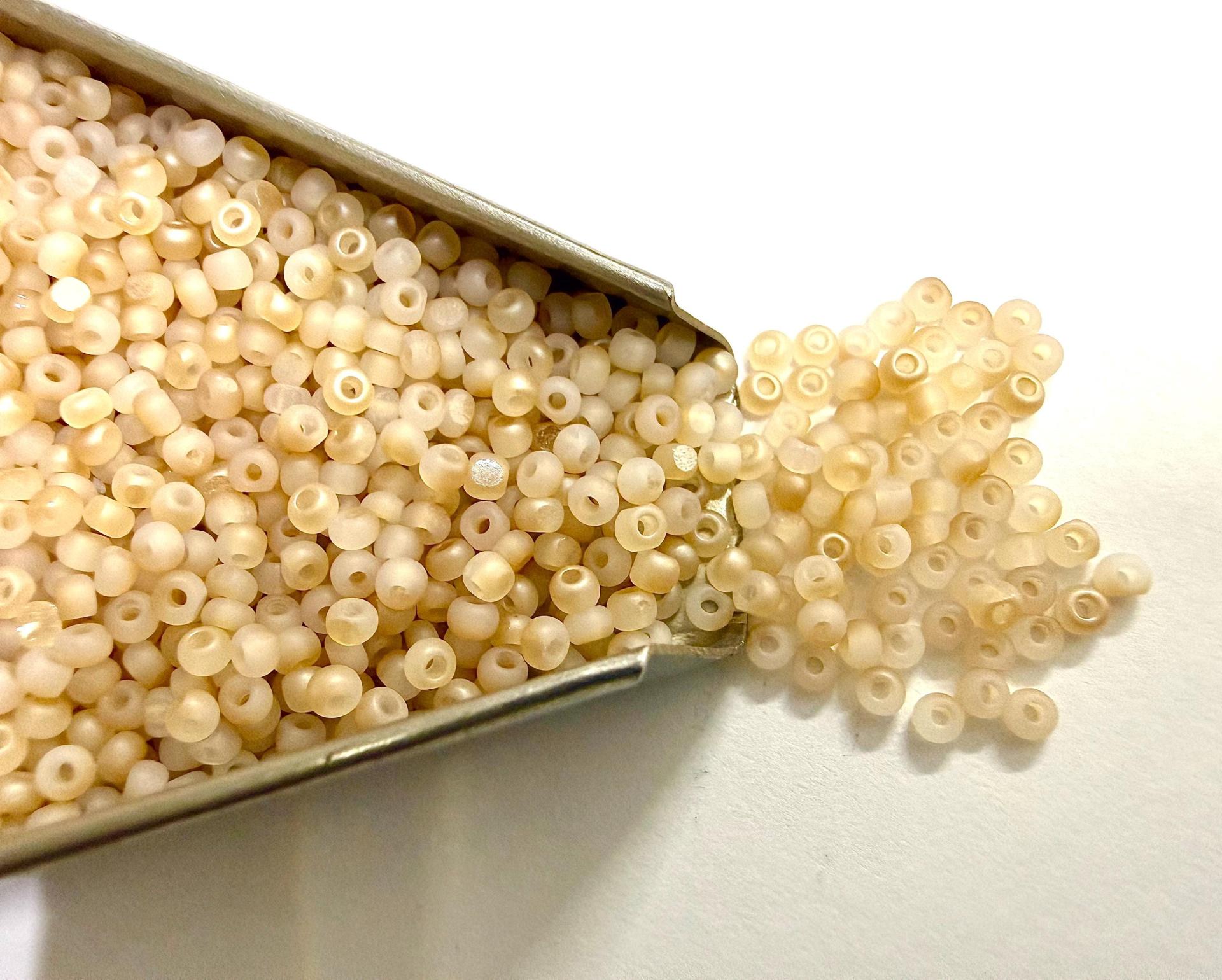 11/0 Charlotte Cut Beads: Matte White Opal Honey