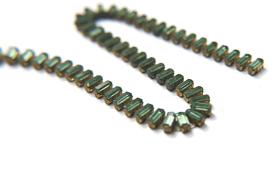 Swarovski Snake Baguette chain 7x3 mm in Erinite (360) settings in Brass 0.5/1/2 Meters